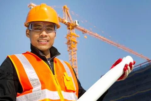 Portraite site manager with safety vest under construction Stock Photos