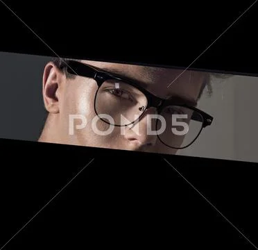 Portriat of a young guy wearing eyeglasses Stock Photos