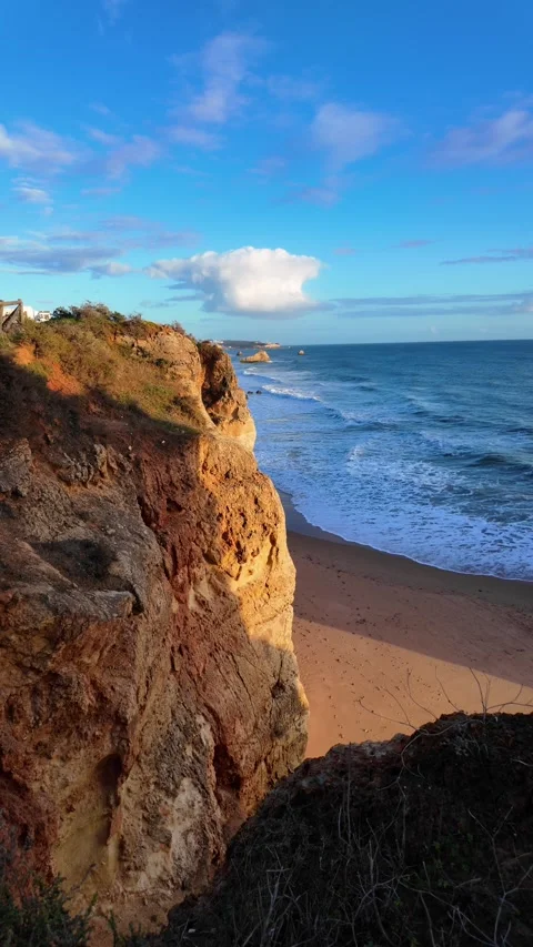 Portugal's Algarve: Dramatic cliffs, golden sunset. Video stock 301647415
