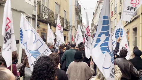 Portuguese Workers Holding Flags in Demonstration Against Labor Reforms Stock Footage 325854836