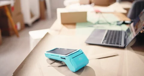 Pos machine, small business and laptop with transactions, startup and payment Stock Footage 321125394