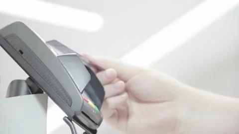 POS terminal, payment machine with a credit card in a man's hand Stock Footage 145000185