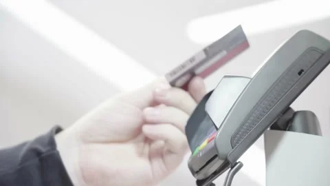 POS terminal, payment machine with a credit card in a man's hand Video stock 145469641