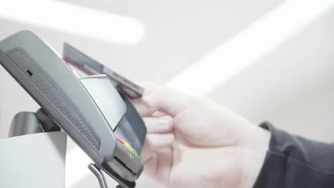 POS terminal, payment machine with a credit card in a man's hand Video stock 166104653