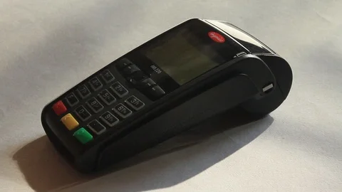 Pos terminal. Turning on the device Stock Footage 97347904