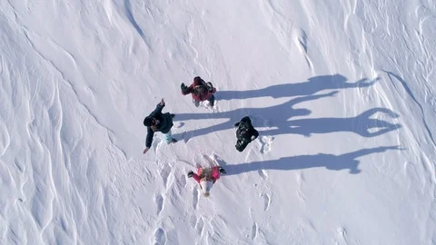 Pose of snow angels Video stock 124424904