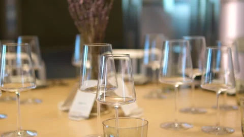 Posh restaurant set table glasses plates. restaurant flashing light work Stock Footage 294210879