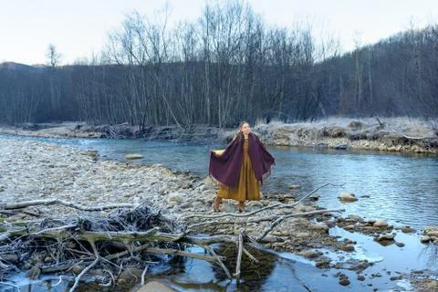Posing on the background of the river Stock Photos