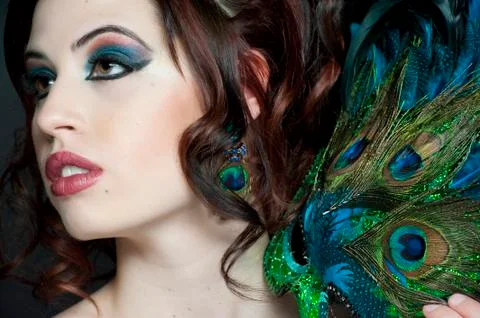 Posing With Feathers Stock Photos