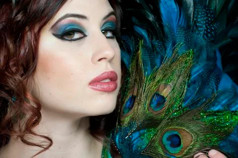 Posing With Feathers Stock Photos