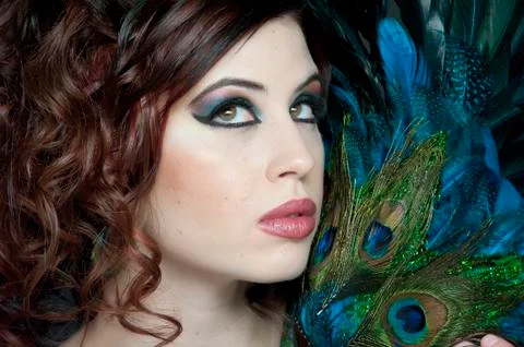 Posing With Feathers Stock Photos