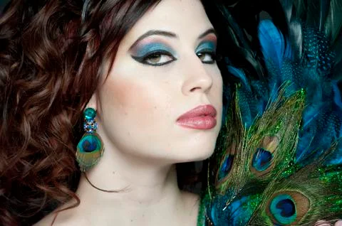 Posing With Feathers Stock Photos