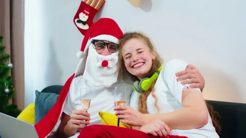 Posing in front of the camera couple very excited in the Christmas time at home Stock Footage 160802743
