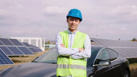 Posing in front of the camera good looking Asian man industrial mechanic with Video stock 170776918