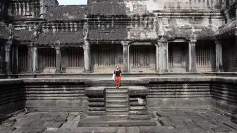 Posing inside Angkor Wat in Siem Reap Stock Footage 99680715