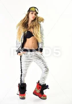 Posing for photo. Before Christmas. Girl in ski or snowboard wear. Happy winter Stock Photos