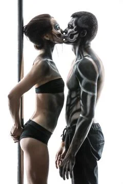 Posing of pole dance couple in studio 스톡 사진