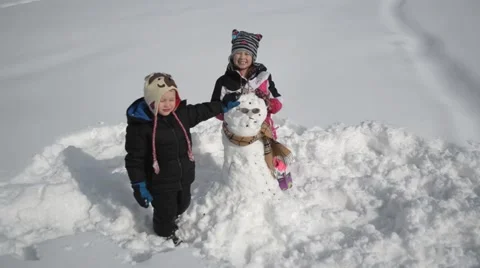 Posing with the snowman Видео 40340513