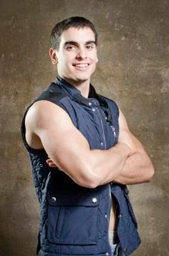 Posing strong man wit crossed arms Stock Photos