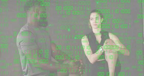 Posing two adults in studio wearing sleeveless black top and light gray t-shirt, Foto stock