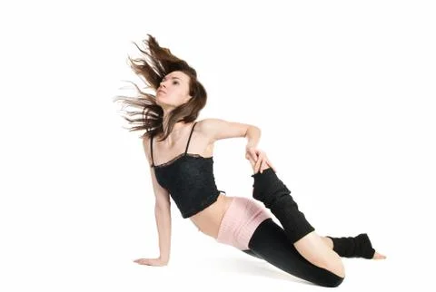 Posing young dancer isolated on white background Photos