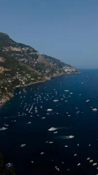 Positano's dramatic cliffs sloping into the deep blue tyrrhenian sea. With numer Stock Photos