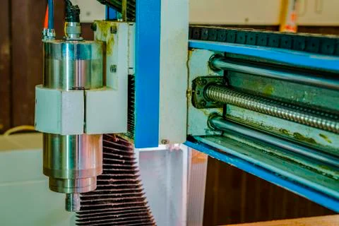 The position of the spindle with the cutter on the movable beam. cnc. Stock Photos