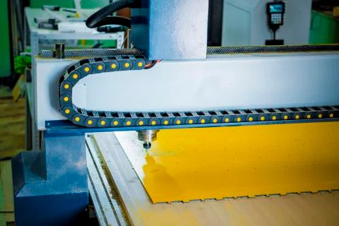 The position of the spindle with the cutter on the movable beam. 스톡 사진