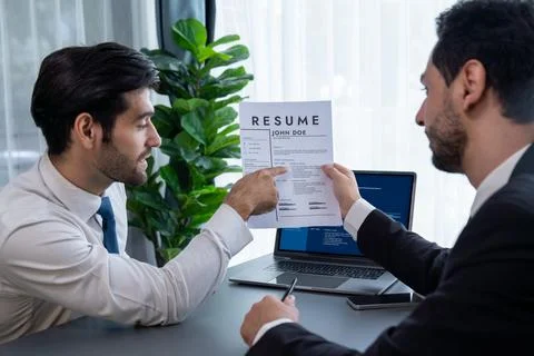 Positive and friendly interview with candidate feeling confident. Fervent Stock Photos