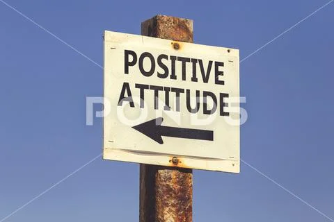 Positive attitude word and arrow signpost Stock Photos