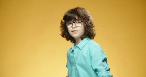 Positive caucasian boy looking at camera, happily smiling and gesturing thumbs Stock-Footage 125760231
