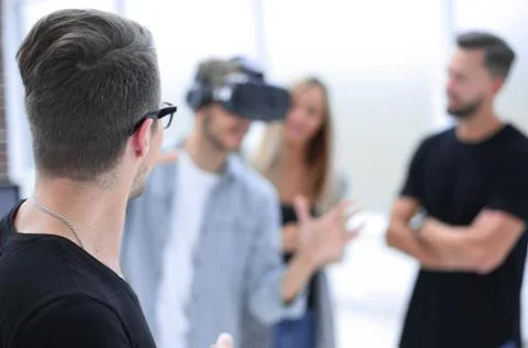 Positive colleagues testing virtual reality glasses 스톡 사진