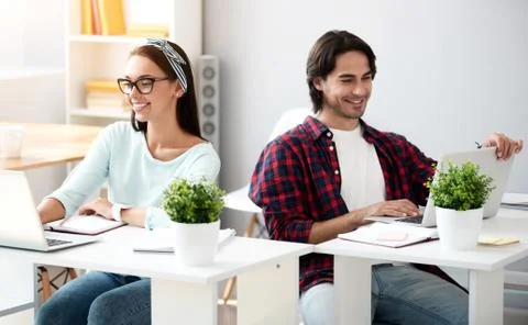 Positive colleagues working in the office Stock Photos