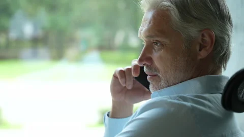 Positive confident manager talking smartphone Stock Footage 295184795