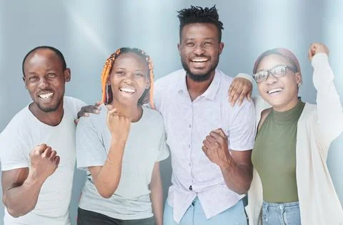 Positive corporate team posing while looking at the camera Stock Photos