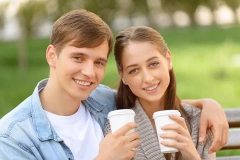 Positive couple drinking coffee Stock Photos
