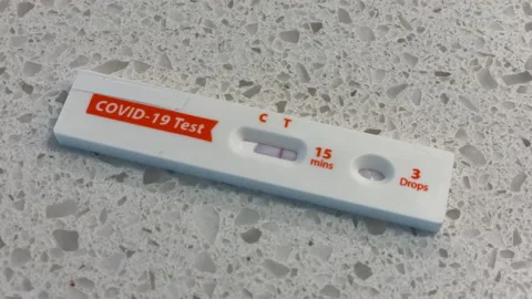 Positive COVID 19 Test Kit Close Up Stock Footage 194516427