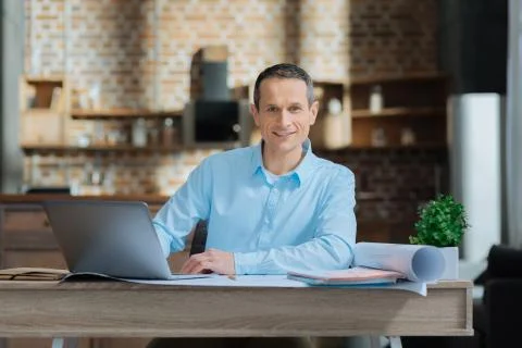 Positive delighted businessman posing on camera Foto stock