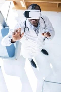 Positive delighted practitioner having break Stock Photos