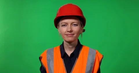 Positive Engineer Woman Looking Camera Explaining Happy Speaker Job Green Screen Video stock 72788979