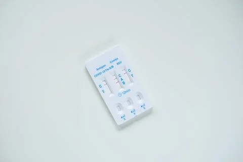 Positive Flu A result on a rapid test for COVID-19, Flu A B, and RSV Stock Photos