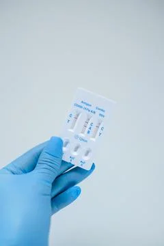 Positive Flu A result on a rapid test for COVID-19, Flu A B, and RSV Stock Photos