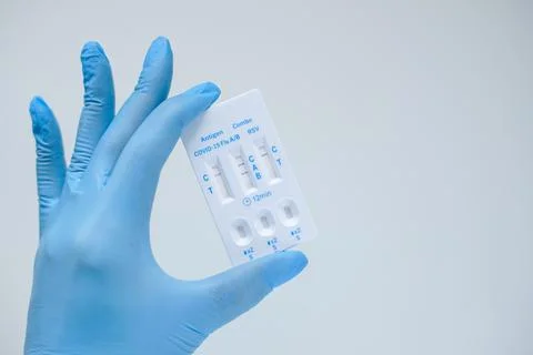 Positive Flu A result on a rapid test for COVID-19, Flu A B, and RSV Stock Photos