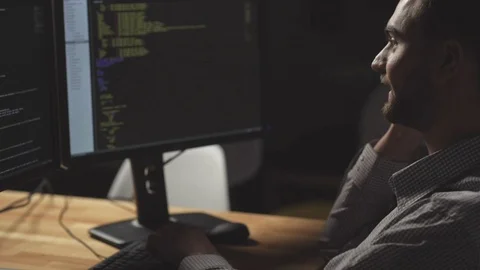 Positive freelance programmer talking on smart phone Stock-Footage 75020469