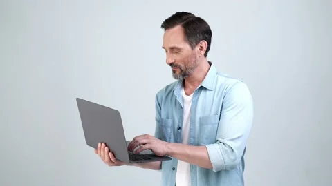 Positive freelance programmer typing laptop direct finger device Stock Footage 161948049