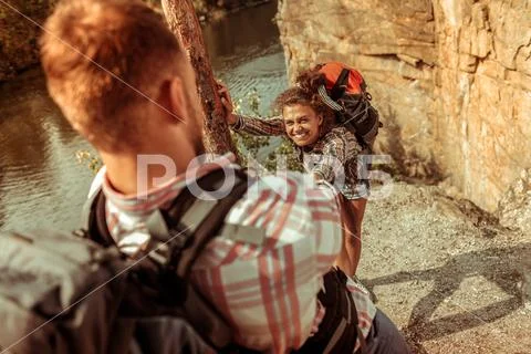 Positive happy woman smiling to her boyfriend Stock Photos