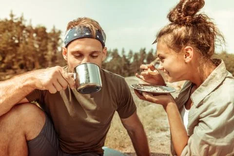 Positive joyful couple having a picnic together Foto stock