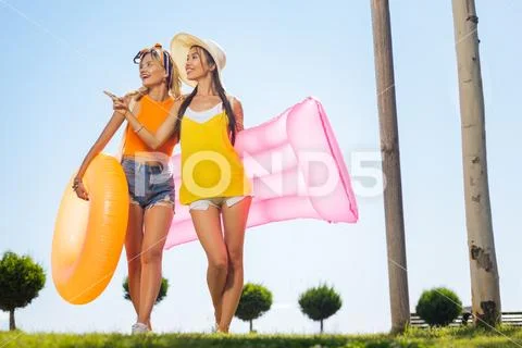 Positive joyful women being prepared for the pool Stock Photos