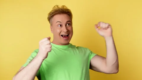 Positive man dancing having fun rhythm to music, enjoying life, entertainment. R Video stock 242113860