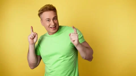 Positive man dancing having fun rhythm to music, enjoying life, entertainment. C Video stock 244845846